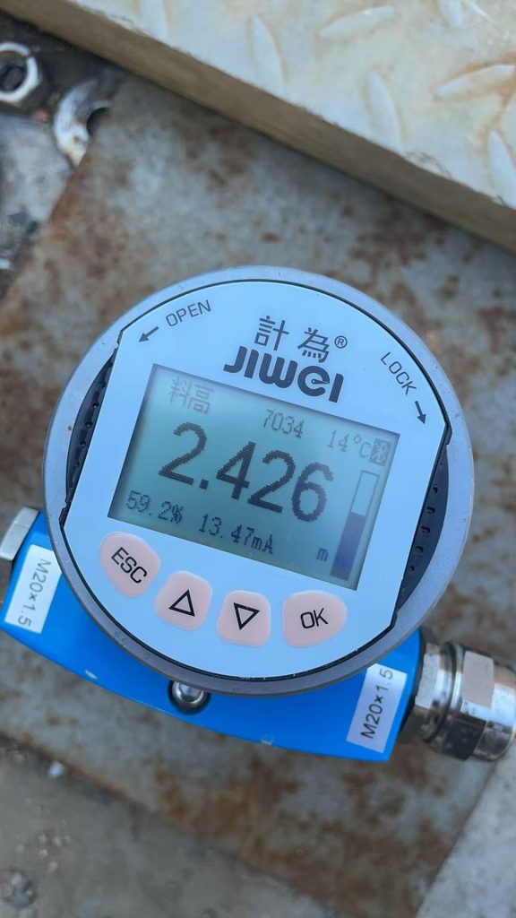 Application of the JWrada-34 Radar Level Meter for Carbon Powder Monitoring in a Large Waste Storage Bin